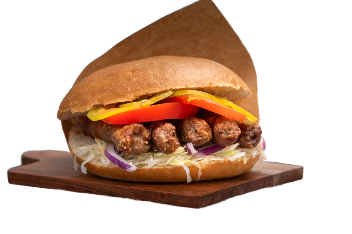 Balkan ćevapi — 5 grilled minced-beef sausages with lepinja, kajmak and ajvar